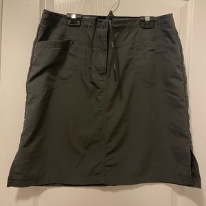 MEC dark grey/black hiking skirt size 12 with front zip and back pockets